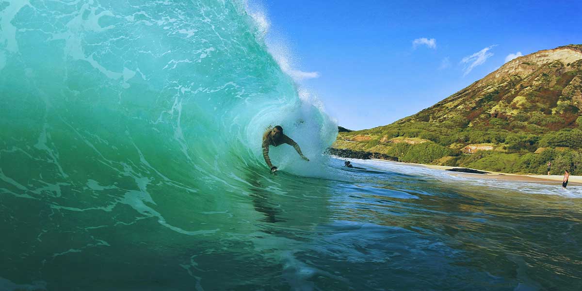 The Ultimate Beginner's Guide to Bodysurfing: Embrace the Ocean's Embrace